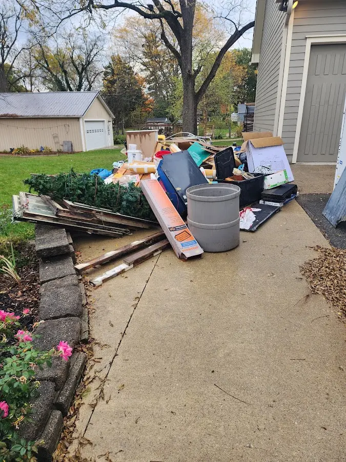 Dumpster being loaded with debris for 3 Yard Dumpster Rental in Fairfield